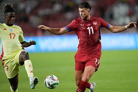 2024-25 Nations League Football Serbia vs Spain: Spain's Nico Williams, left, challenges for the ball with Serbia's Lazar Samardzic